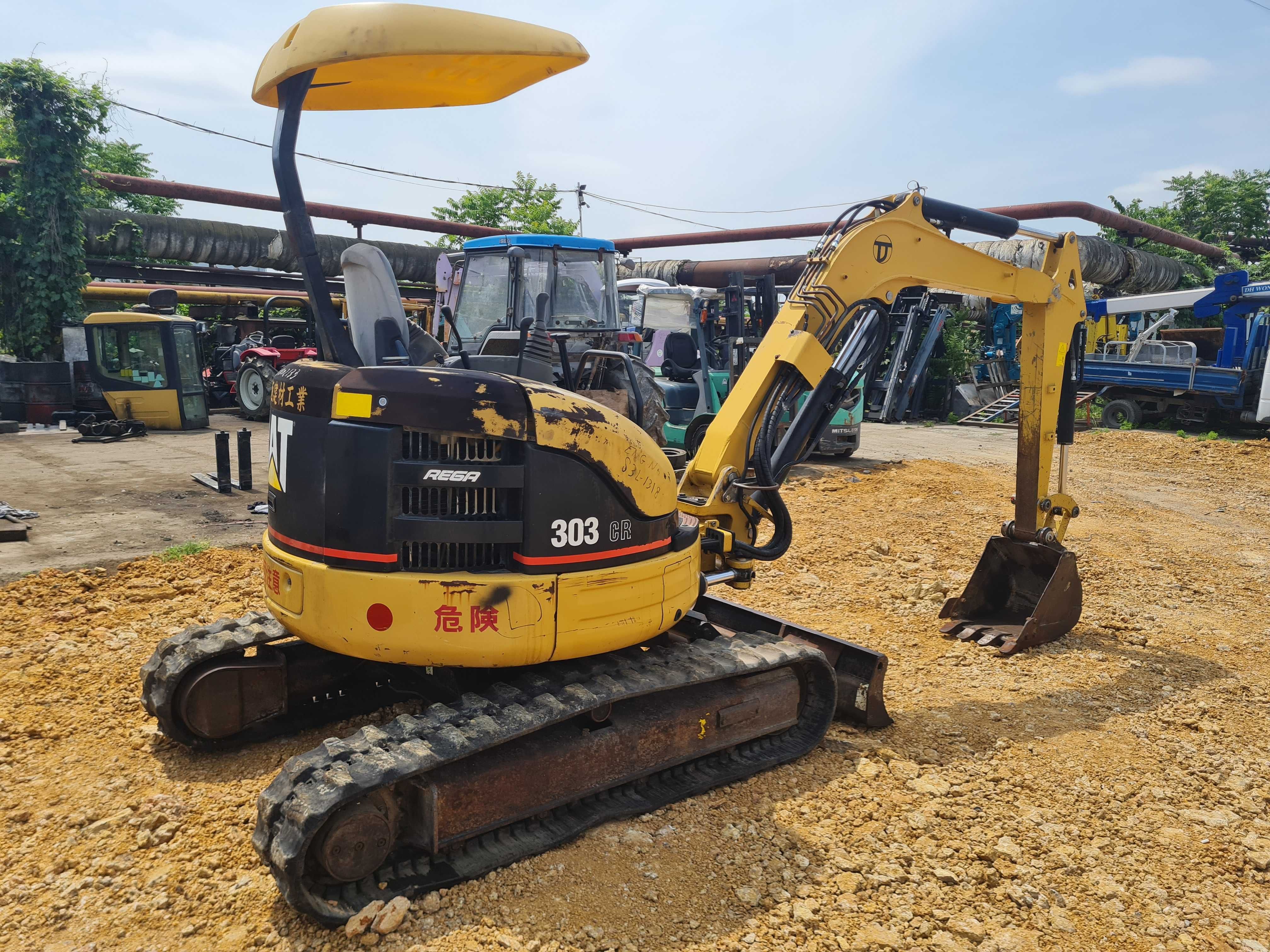 Міні-екскаватор CATERPILLAR 303