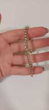 Pulseira dourada com brilhantes