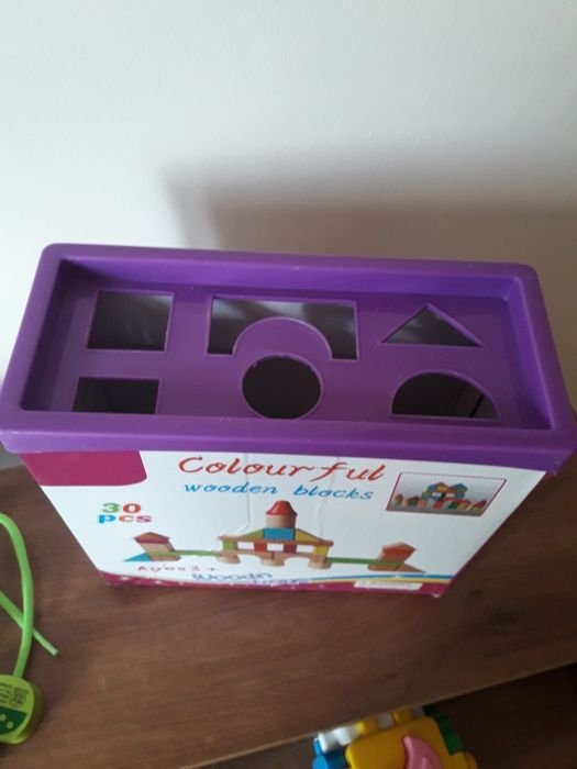 Дерев'яні кубики,куб сортер, стукалка Tolo,каталка Battat