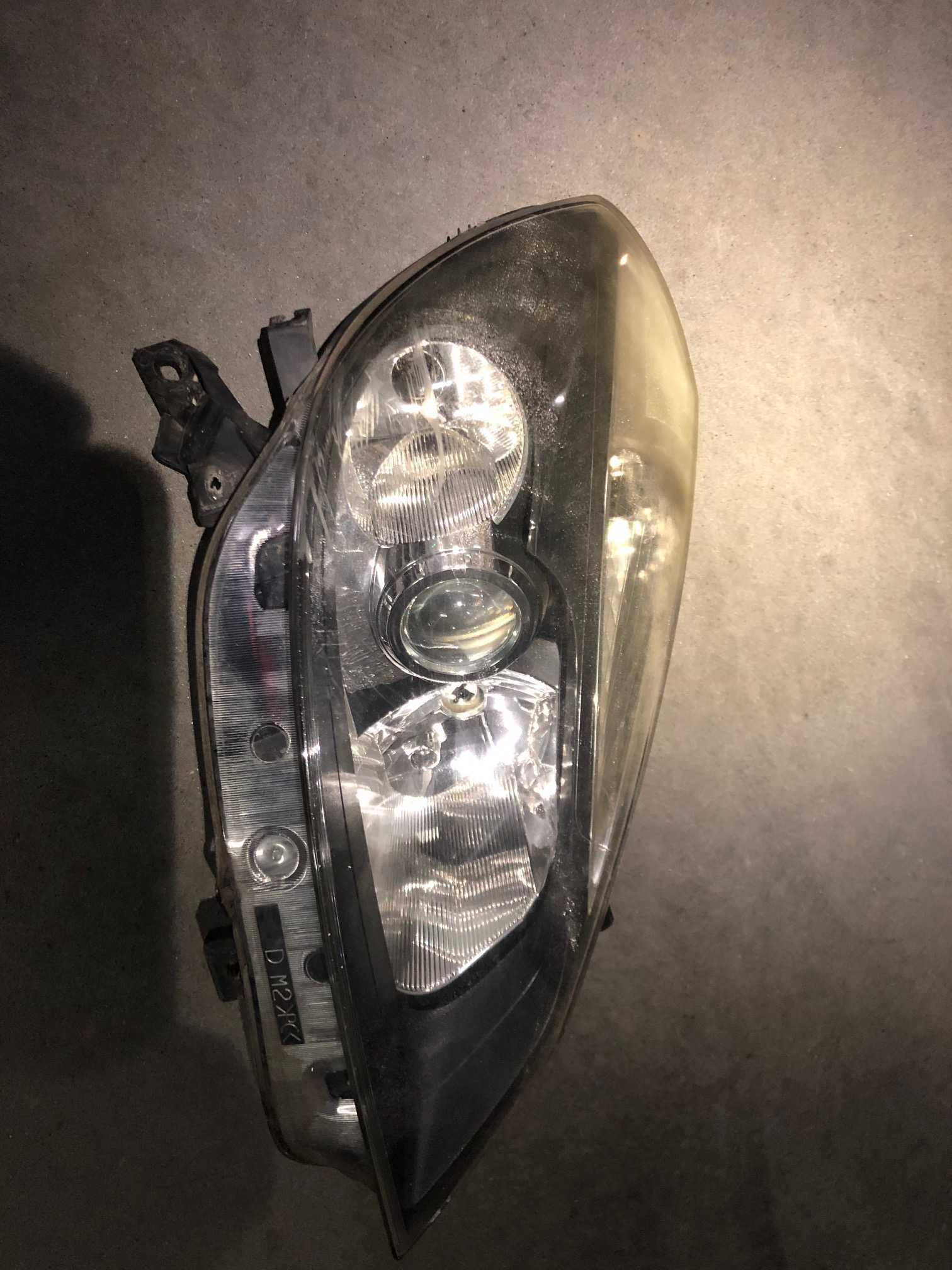 Lampa renault clio III 3, reflektor przedni prawy, valeo europa