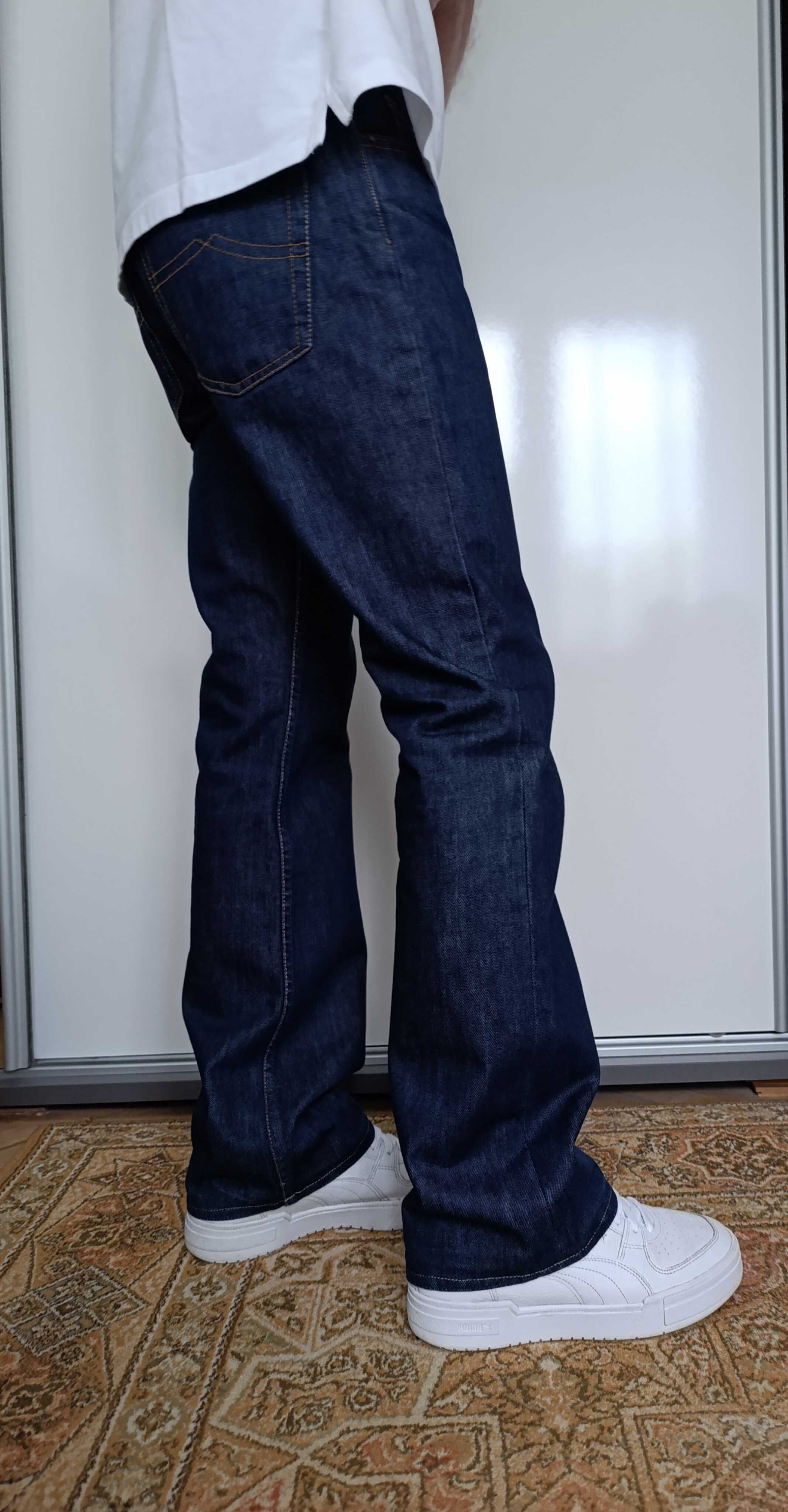 Granatowe spodnie Divided jeans dżins bawełna