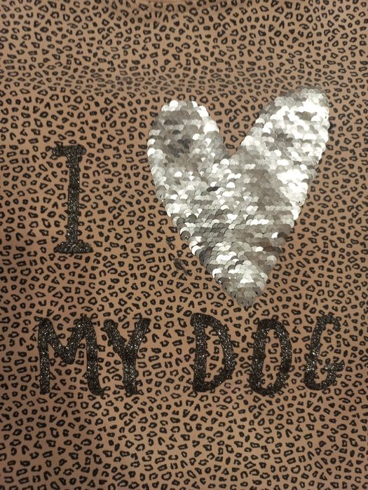 Bluzeczki dziewczęce z długim rękawem w rozm. 98-104 i 104.