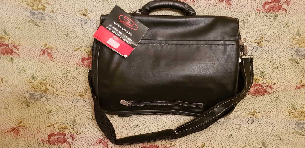 Продам новый кожаный мцжской портфель