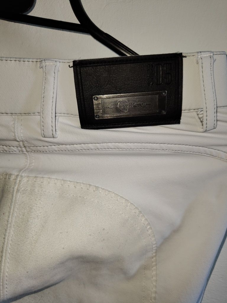 Białe markowe bryczesy covalliero r 40/L pełny lej elastyczne spodnie