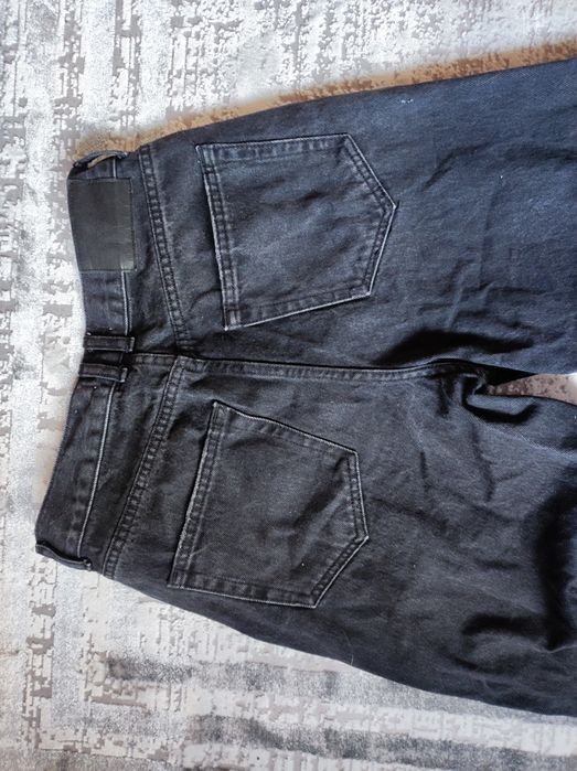 Spodnie z wysokim stanem szerokiemu nogawki