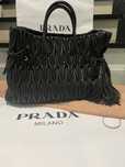 Torba Miu Miu, Prada skora