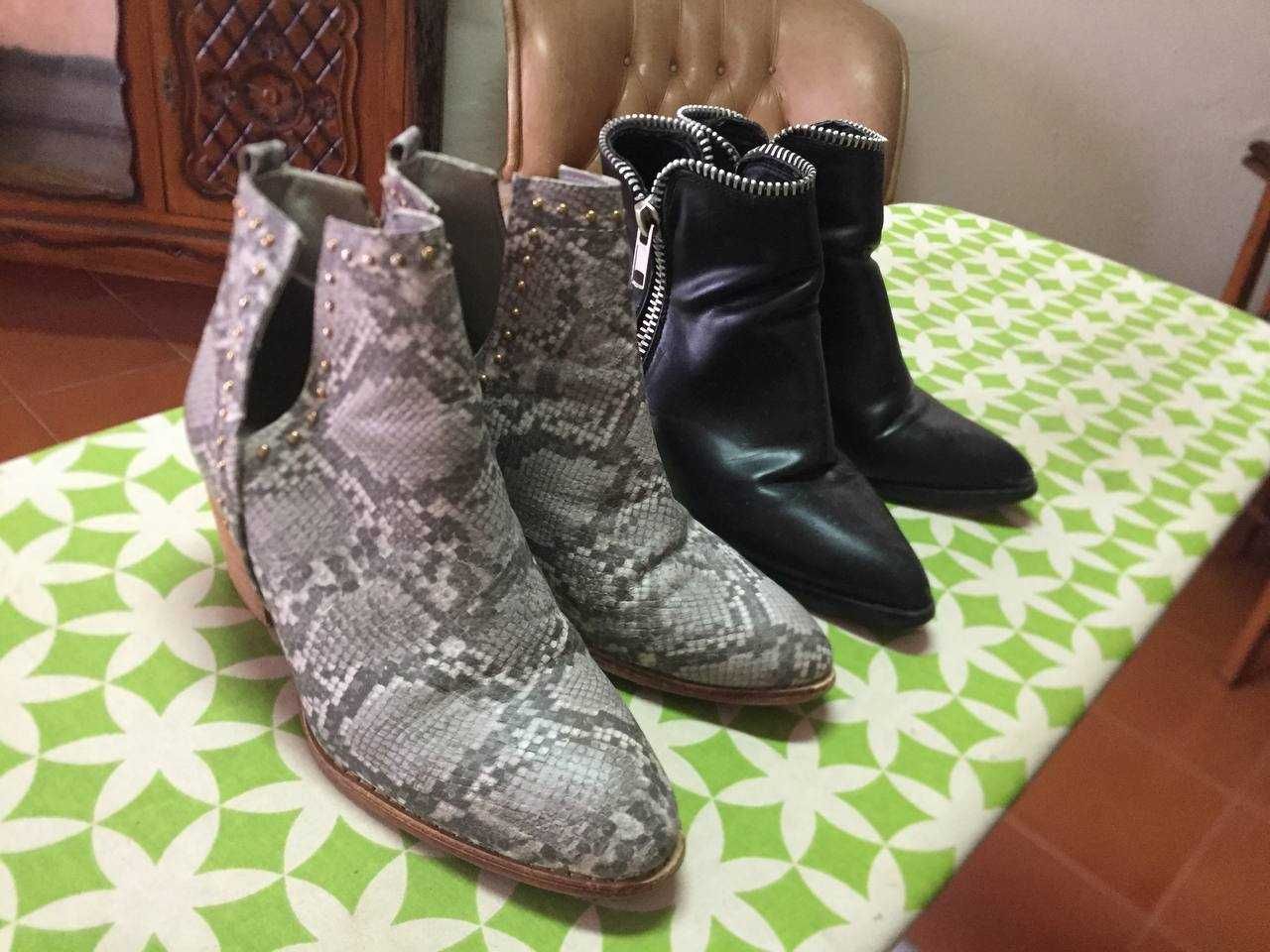 Conjunto de peças de calçado: sapatilhas, sapatos, botins e botas.