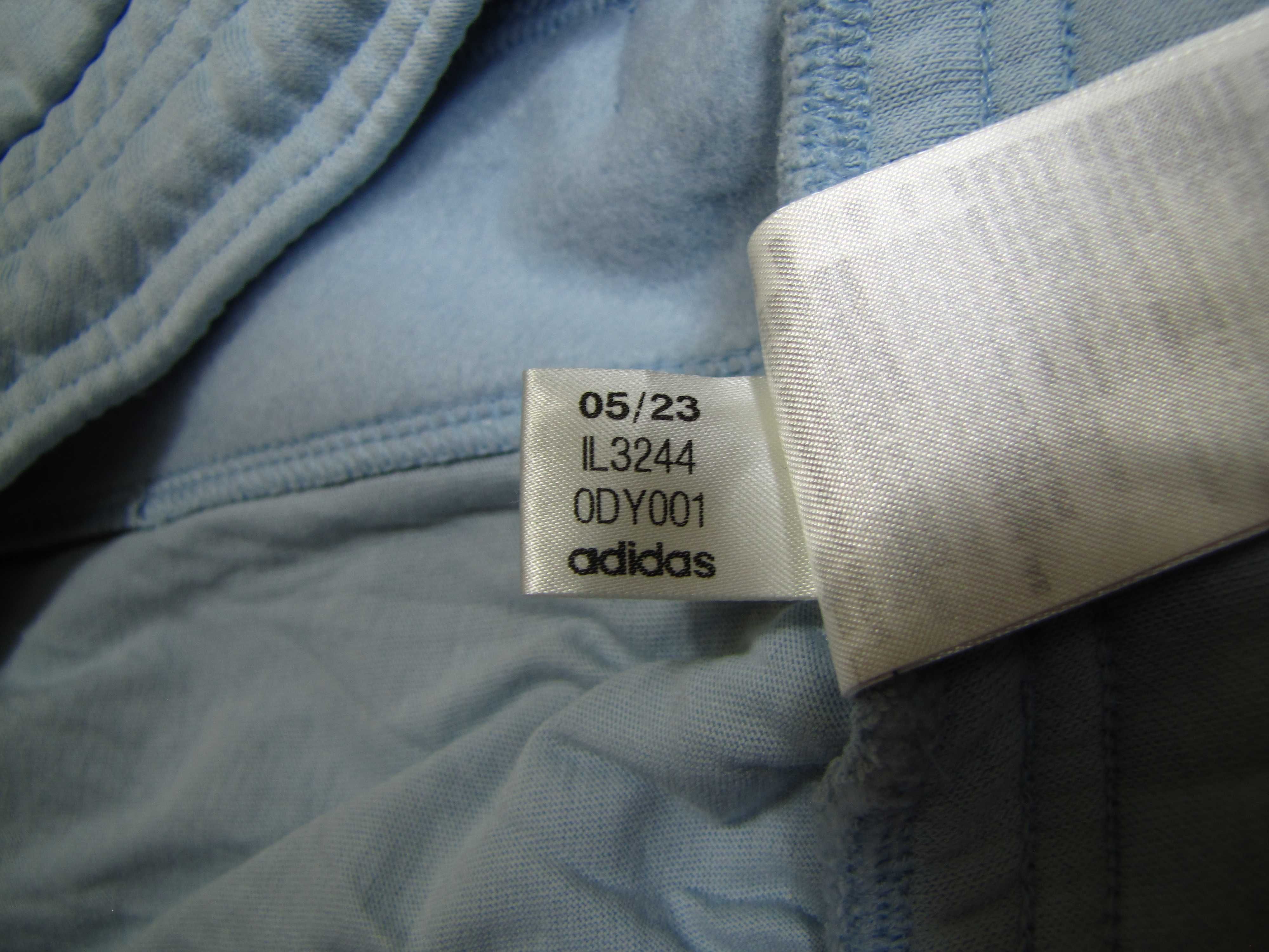 Damskie spodnie dresowe adidas All SZN Fleece Graphic