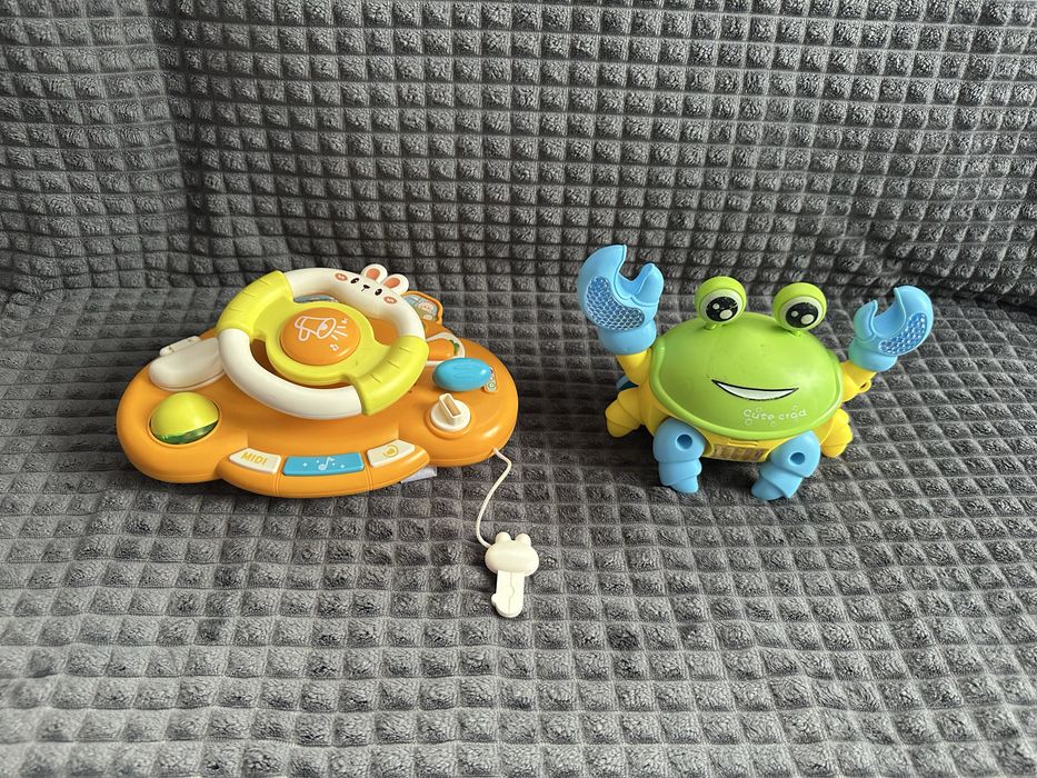 Музичний руль на коляску, танцюючий крабік, іграшки