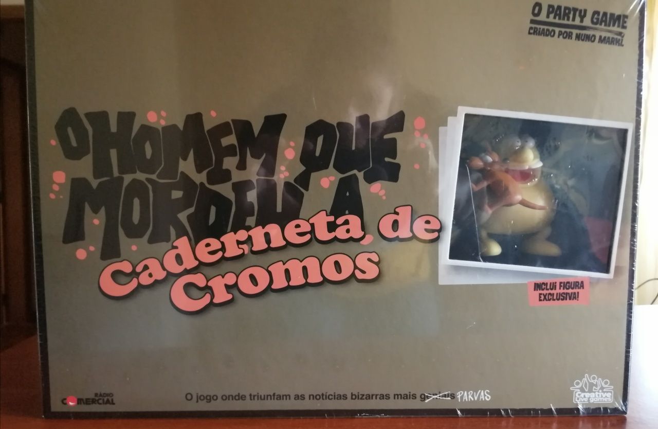 Jogo Homem que mordeu o cão caderneta de cromos delux