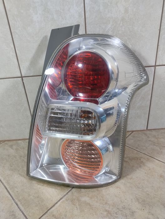 Toyota Corolla Verso 2 II lift Europa lampa tył prawa wysyłka OLX kpl