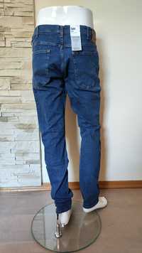 Lee Luke Slim Tapered Mid Stone Wash męskie jeansy rozmiar 36/34