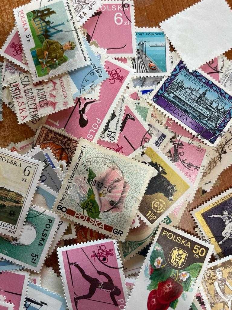Vários lotes de 100 selos antigos da Polónia