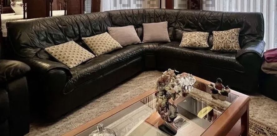 Sofá de canto verde garrafa