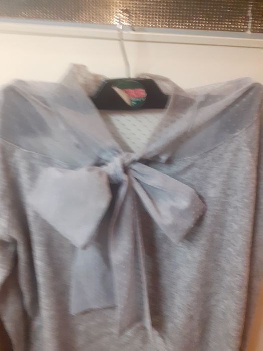 Atrakcyjny sweterek  Marki Reserved