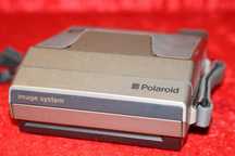 Máquina fotográfica Polaroid image systeam, a funcionar em pleno
