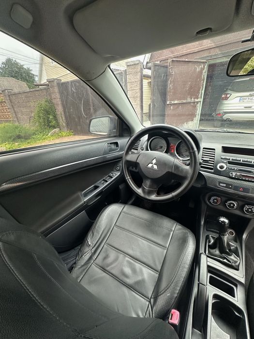 Mitsubishi lancer х 10.   1.5 газ/бензин