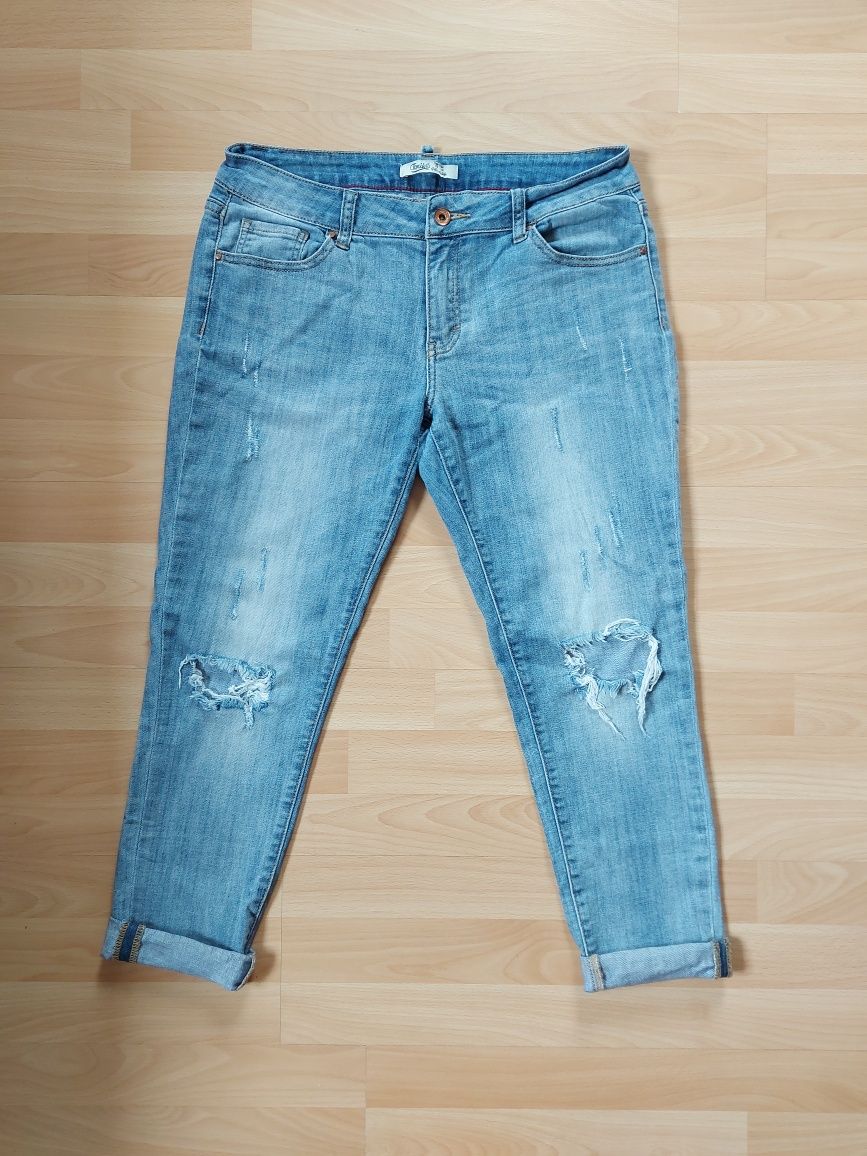 Damskie jeansy z dziurami/rozdarciami rozm. 42