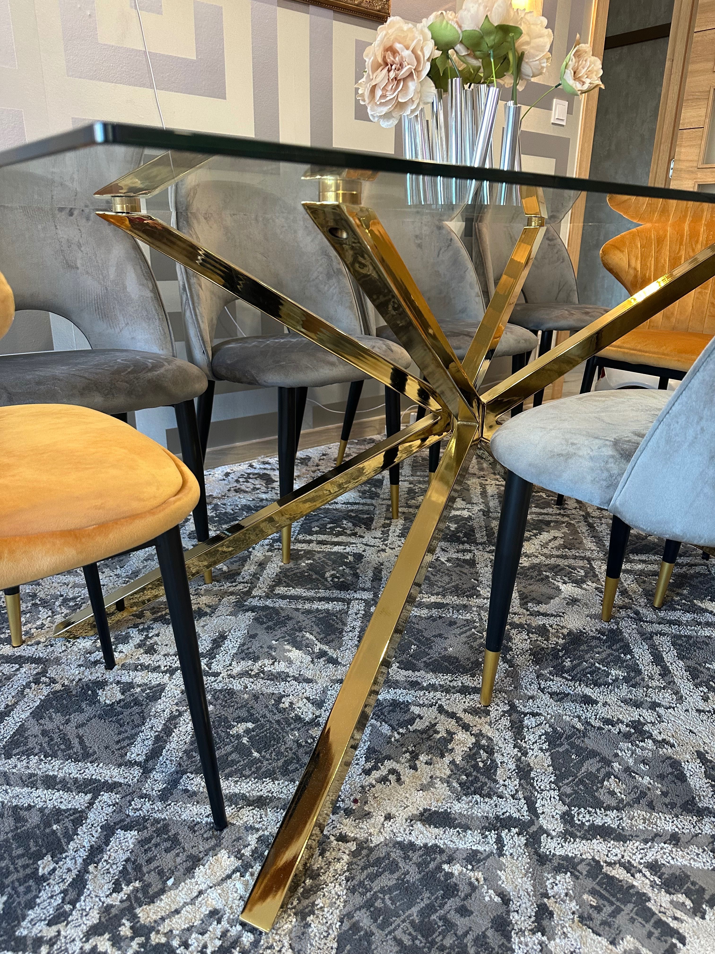 Mesa de vidro e pés em dourado