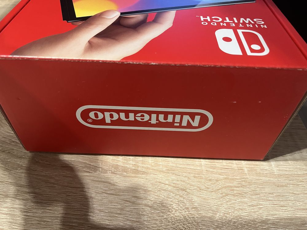 Nintendo Switch OLED Branca + Mumba oficial Case