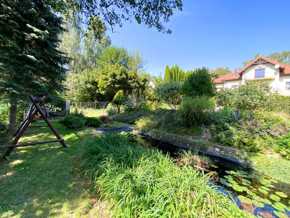 Słoneczny dom z piękną działką Spokojna okolica blisko miasta