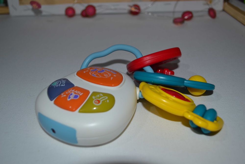 Розпродаж Музична іграшка брязкальце зі світловими ефектами Брелок з к