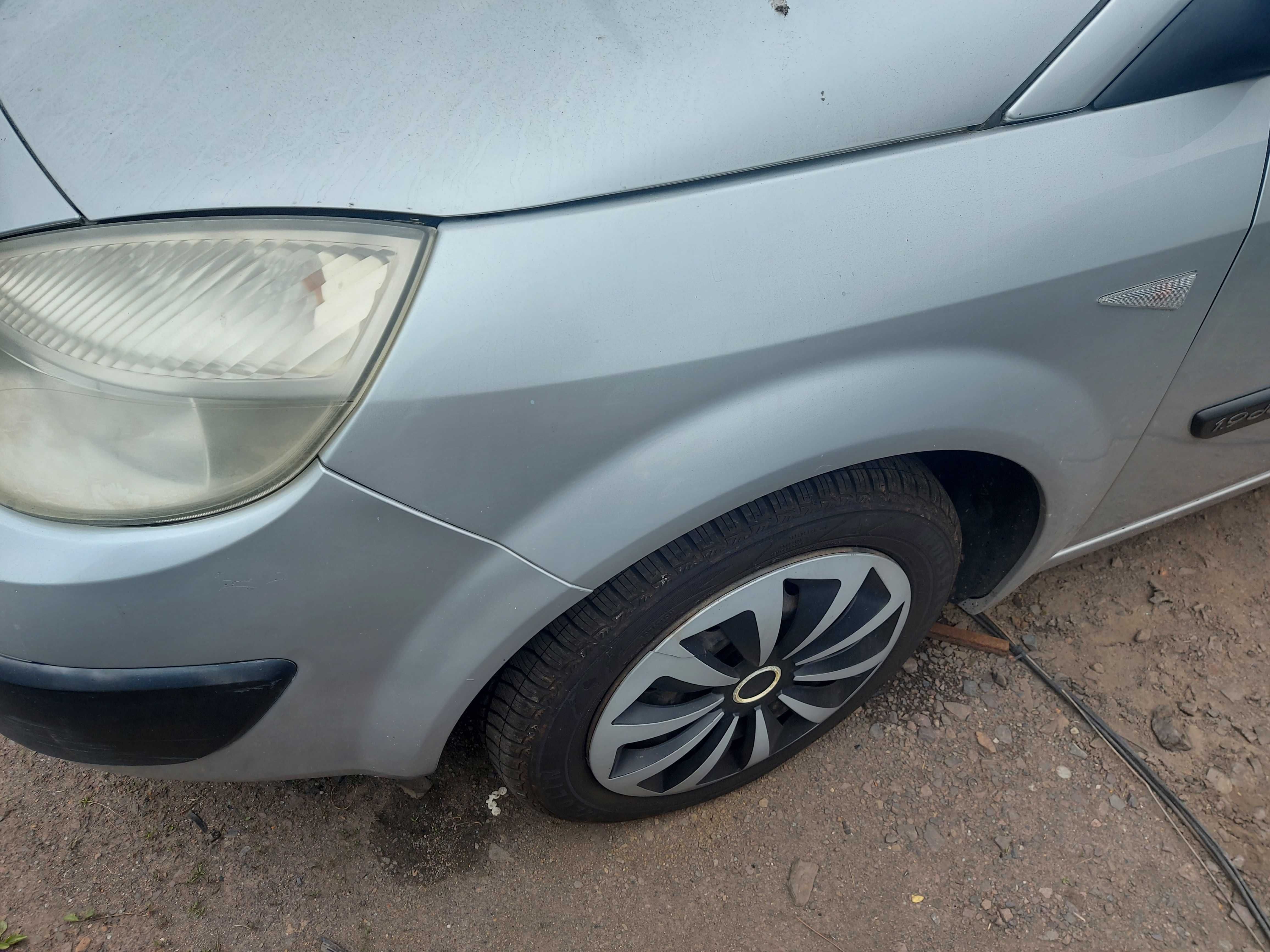 Renault Grand Scenic II TED69 błotnik przedni FV dostawa