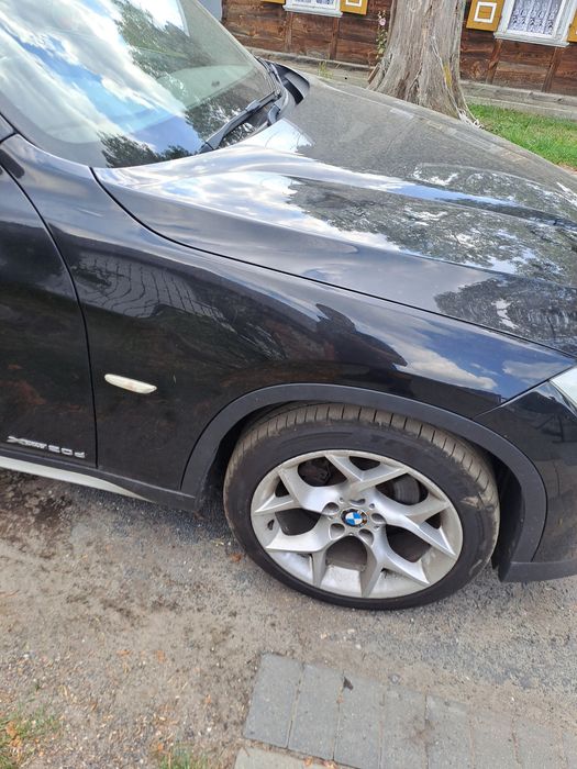 Błotnik prawy  bmw x1 e84 black sapphire 475