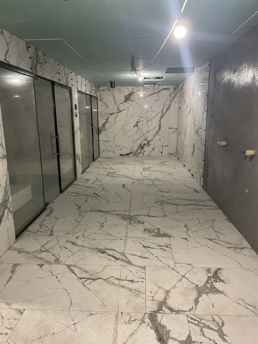 Облицювання плиткою та інші будівельні роботи