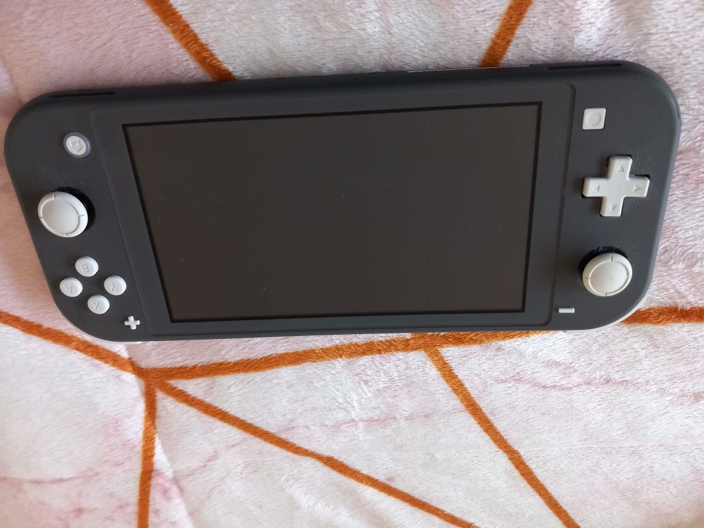 Vendo Nintendo switch lite cinzenta
