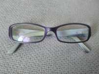 Oprawki /okulary/ damskie Prada.