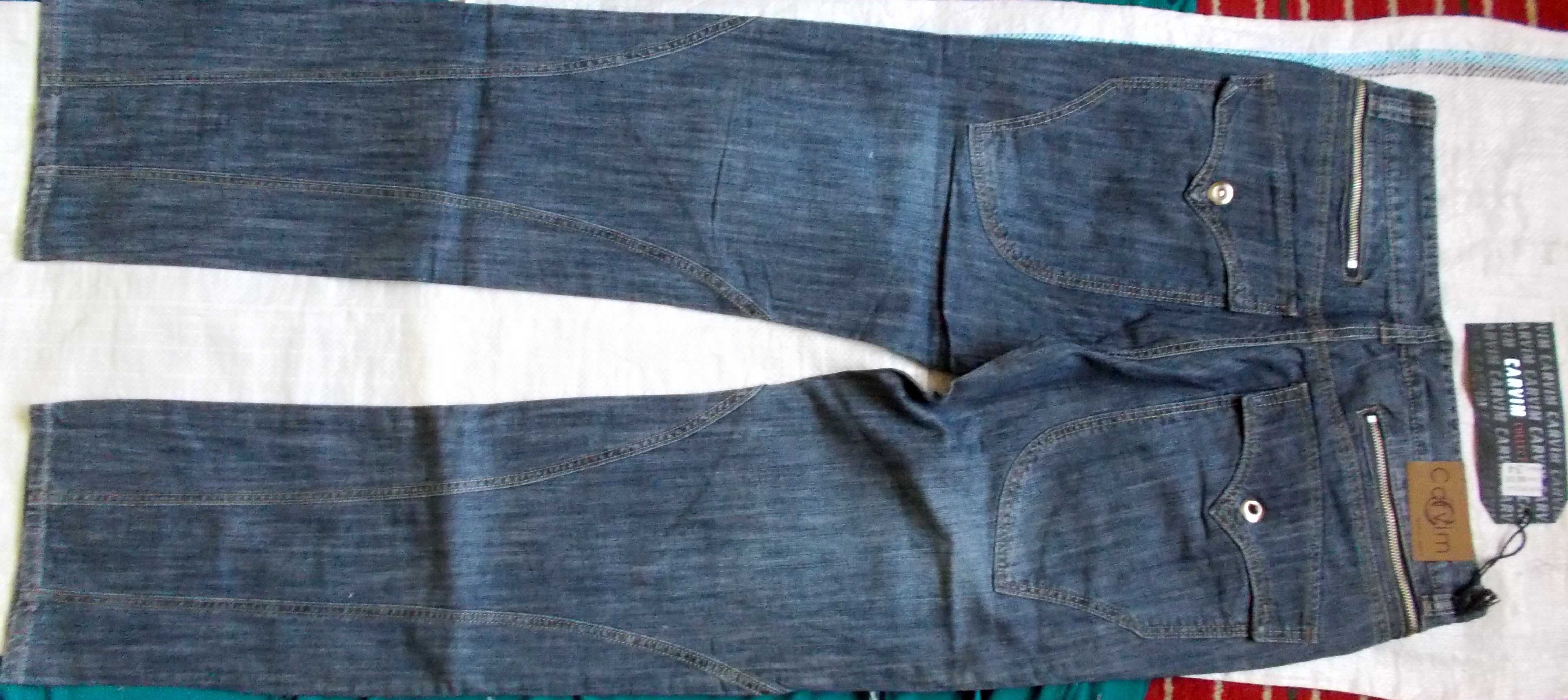 джинсы с множеством карманов,88 см.пояс.Новые