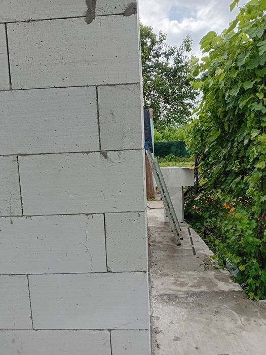 Мурування стін із газобетона цегли шлакоблока.