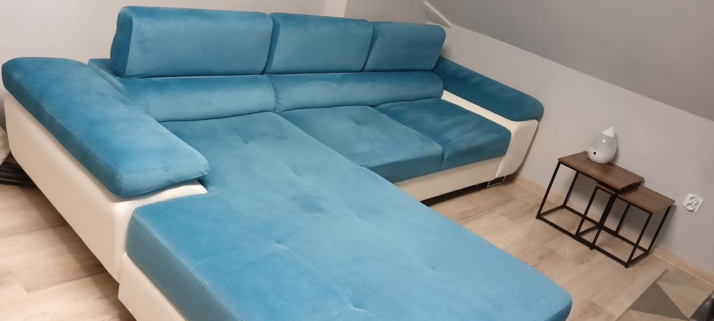 Kanapa rogówka z funkcją spania i pojemnikiem