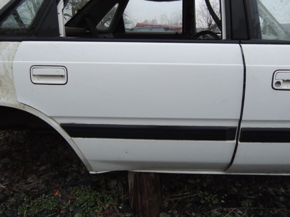 Drzwi prawe przednie tylne Mazda 626 87,88,89,90,91,92 sedan