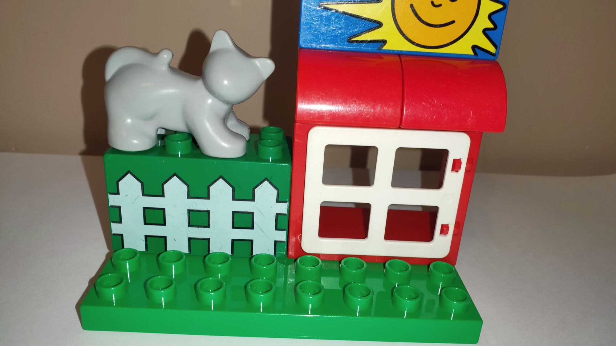 Klocki LEGO Duplo kotek płot domek słońce