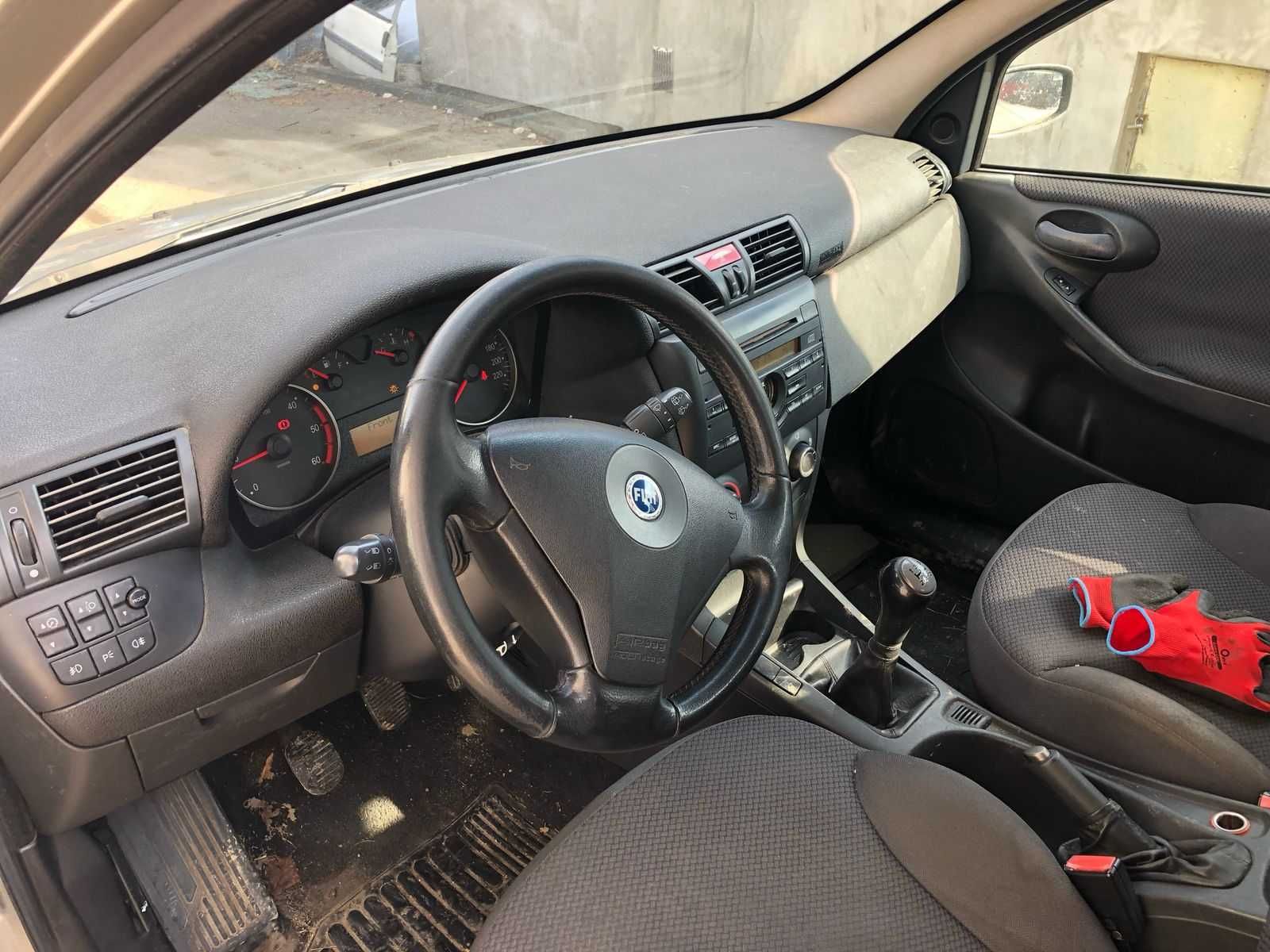 Fiat Stilo na części silnik 1.9jtd  silnik/skrzynia/belka/drzwi/lampy