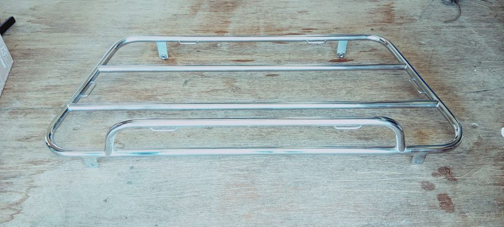 Suporte/grelha para mala