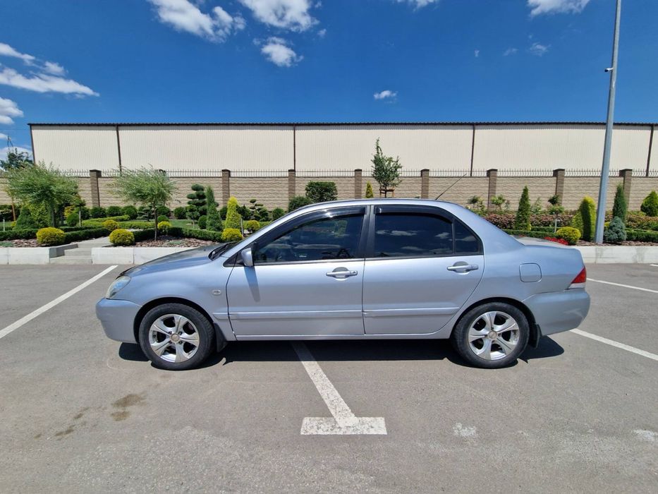 Mitsubishi Lancer 9 бензин 1.6