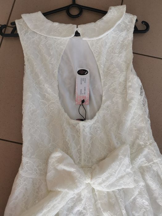 Sukienka koronkowa z kokardą z koronki bez rękawów midi ślub wesele el