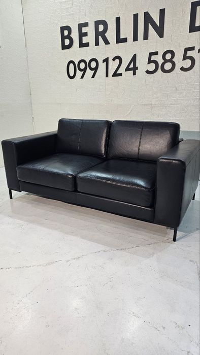 Шкіряний  диван чорного кольору. Німеччина