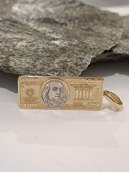 Złota zawieszka Dolar pr.585 Nowa 4 x 1.2 cm