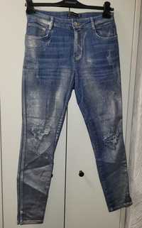 Jeansy ze srebrnym połyskiem Zara rozmiar 40