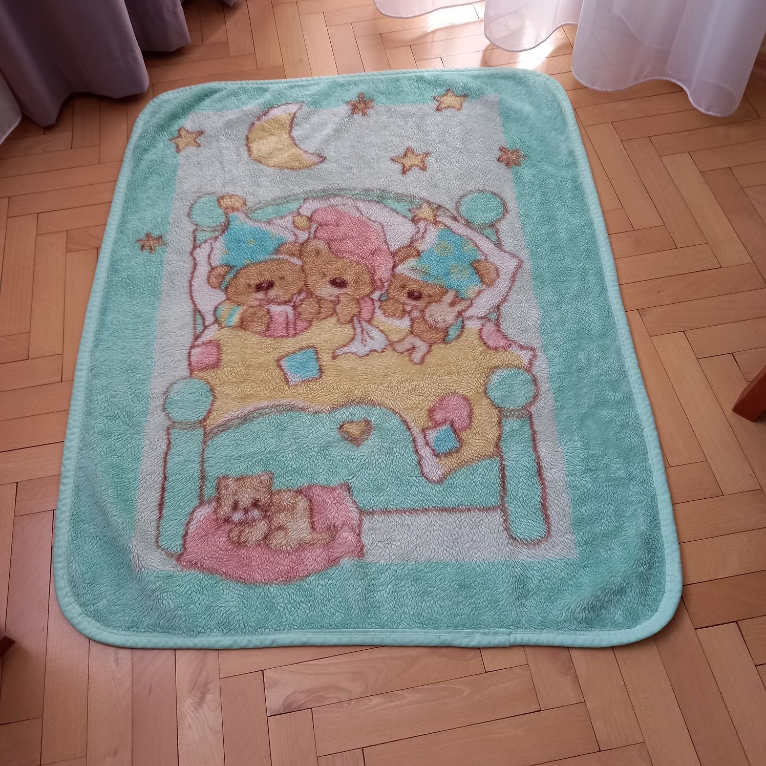 Kocyk niemowlęcy o wymiarach 81/106 cm