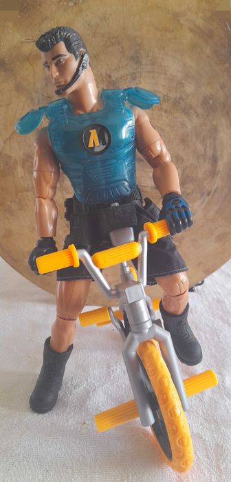 Action man  com bicicleta 1990