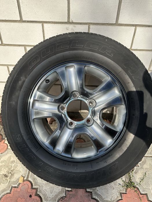 Диски оригінальні та резина на Toyota Land Cruiser 100 265/65/R17 112S