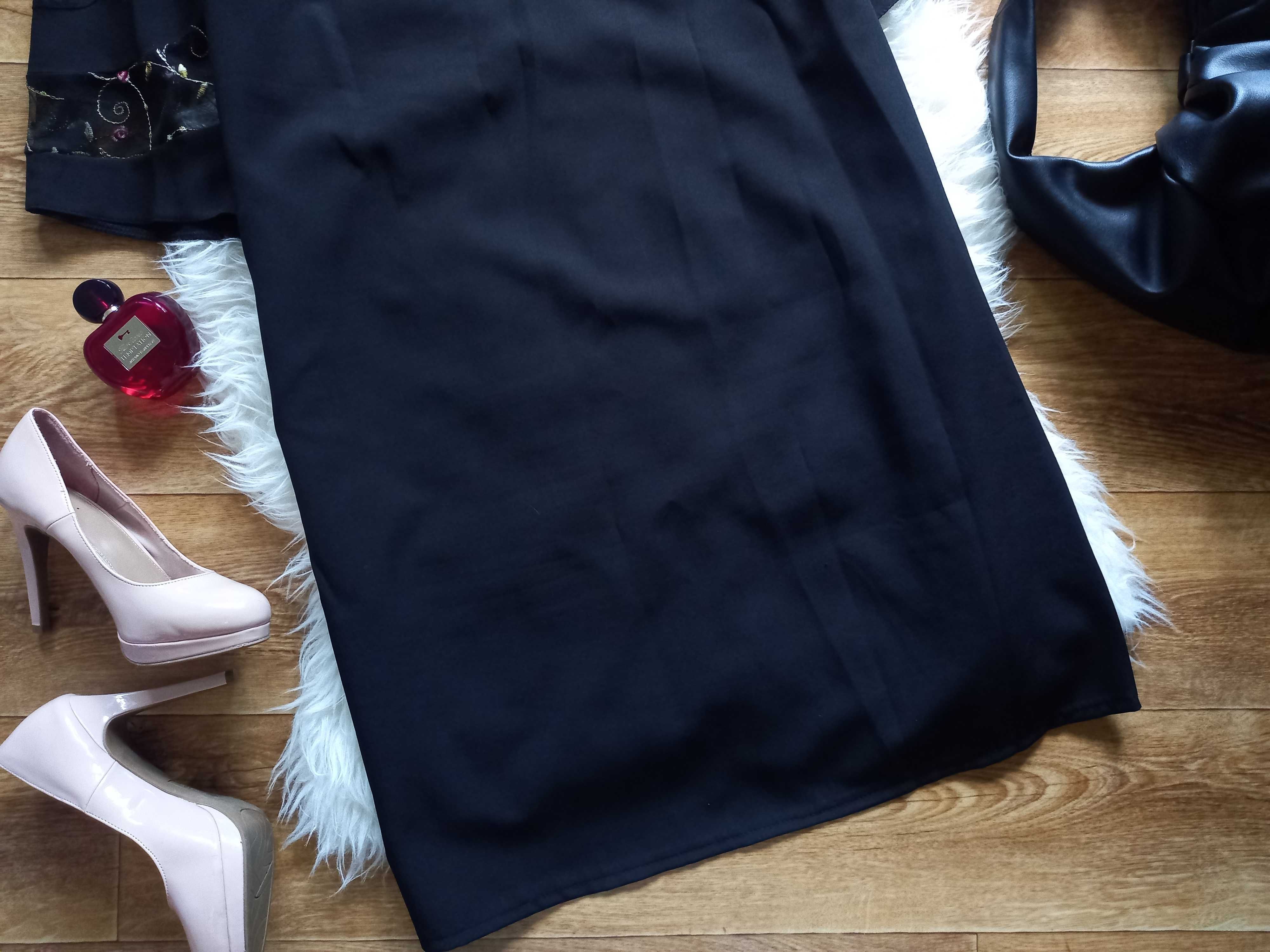 Элегантное черное платье с вышивкой