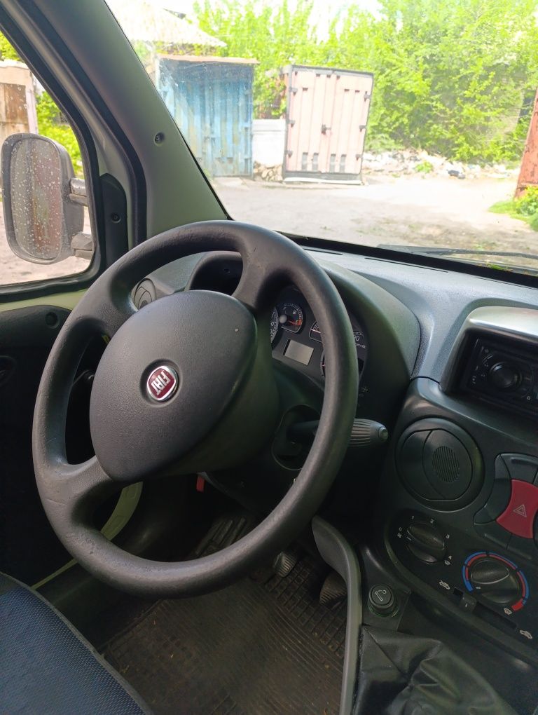 Хороший Fiat Doblo 2013 1.4 г/б по тп