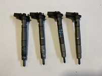 Wtryskiwacze 2.0 TDI Audi A3 0445116030 03L130277 OE