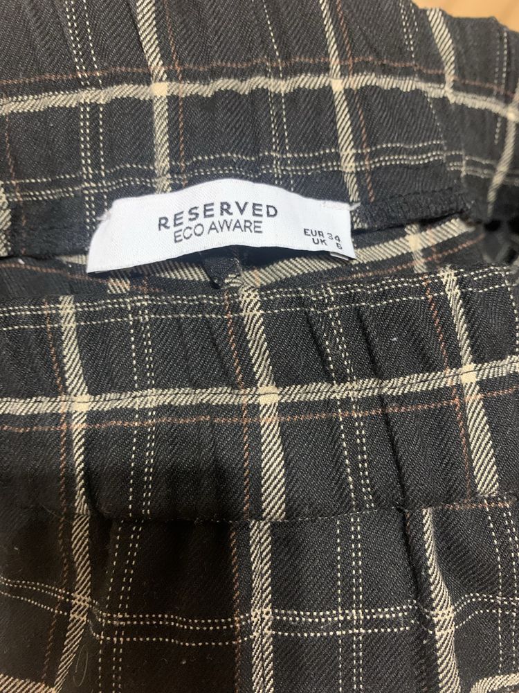 Spodnie w kratę Reserved